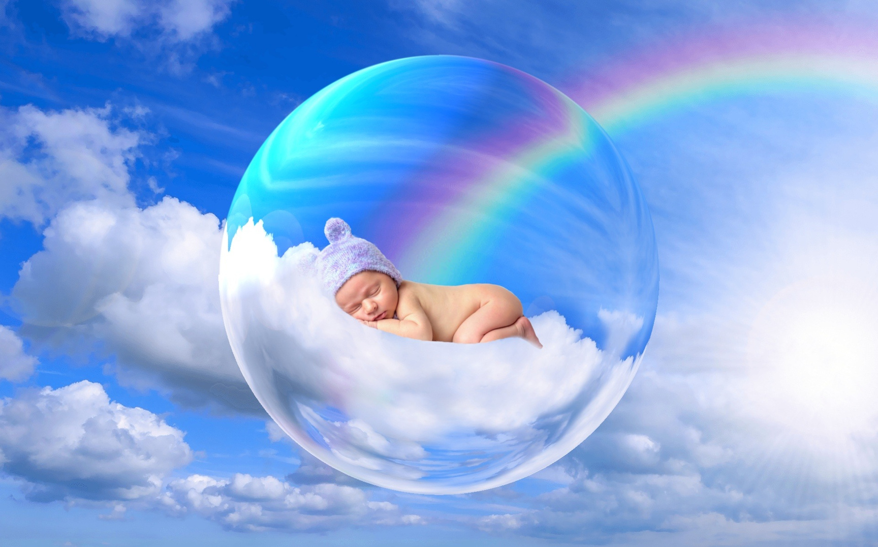 Photomontage Of Baby In A Bubble In The Clouds